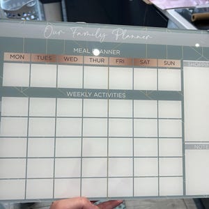 Samantha added a photo of their purchase