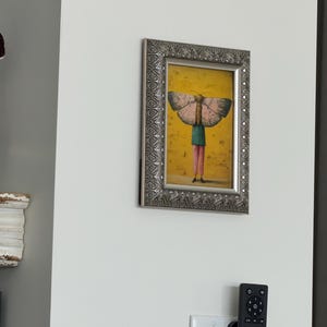 Lisa added a photo of their purchase