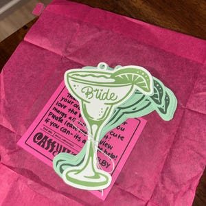 Sarah added a photo of their purchase