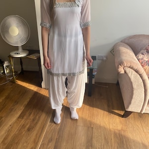 Shalini added a photo of their purchase