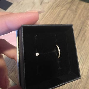 Alona added a photo of their purchase
