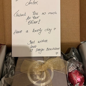 Hermione added a photo of their purchase