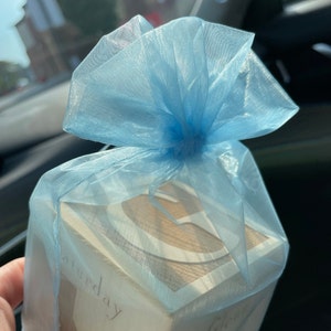 Laura added a photo of their purchase