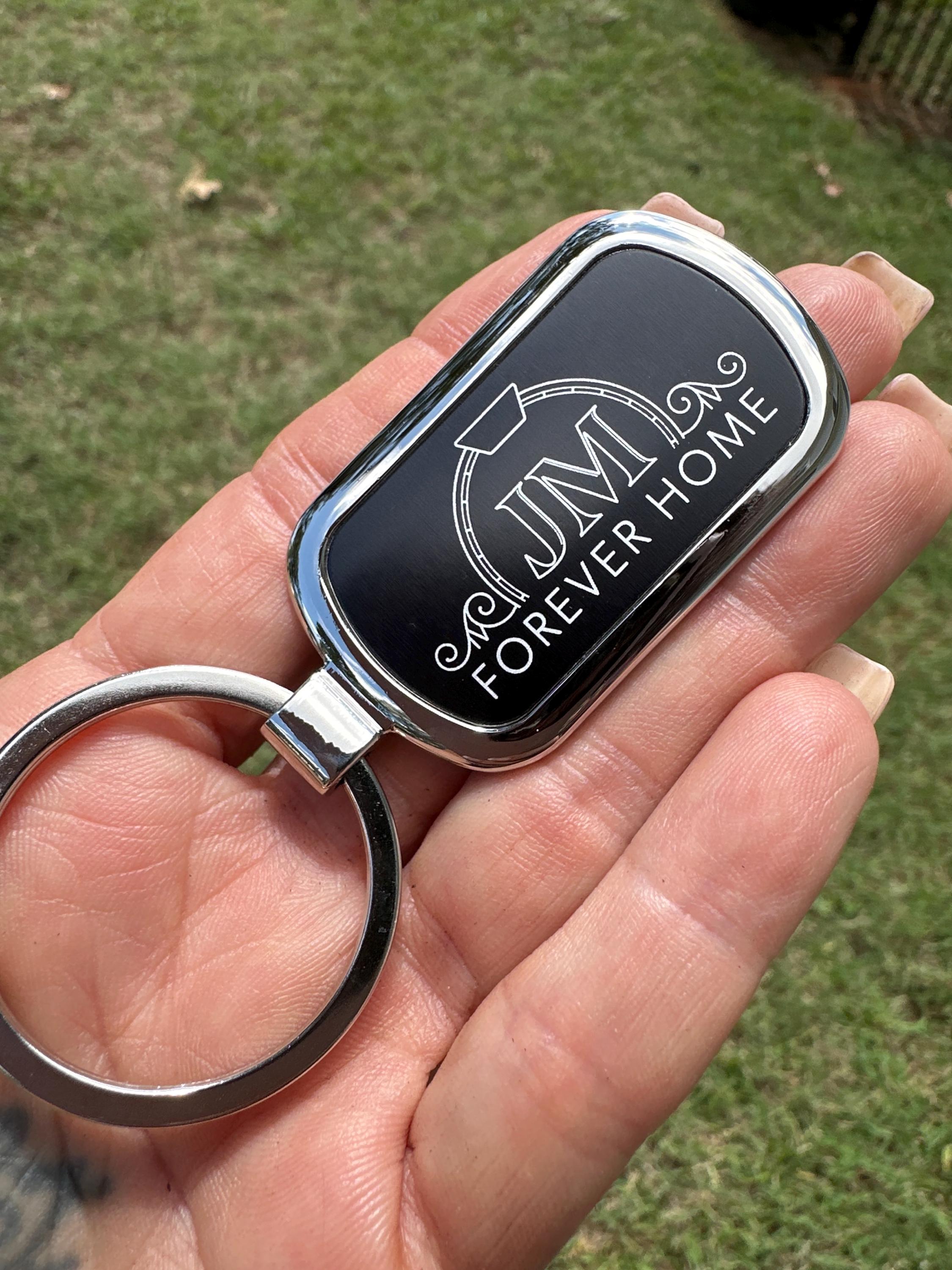 Customer photo of Custom Logo Etched Metal Keychain from Janet