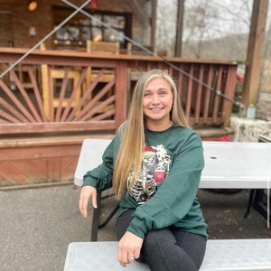 Olivia added a photo of their purchase
