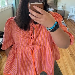 Mikaela added a photo of their purchase