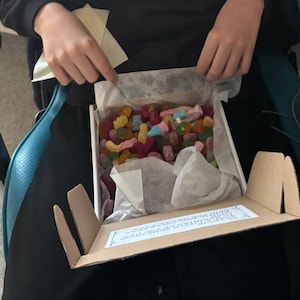 Zoe added a photo of their purchase