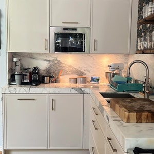 Elena added a photo of their purchase