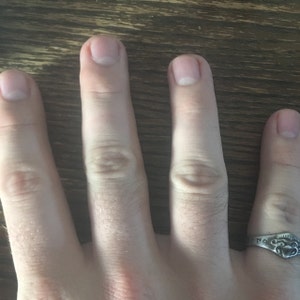 Nickolas Abbott added a photo of their purchase