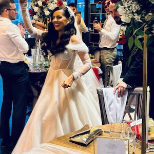 Sarah added a photo of their purchase