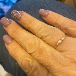 Elaine added a photo of their purchase