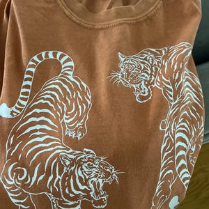 Samantha added a photo of their purchase