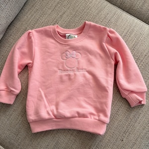Elizabeth added a photo of their purchase