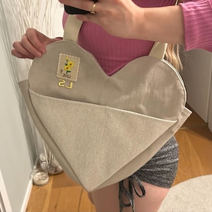 Nina added a photo of their purchase