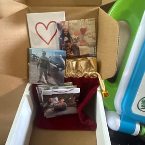 Adriana added a photo of their purchase