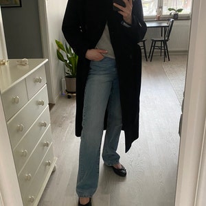 Sabina added a photo of their purchase