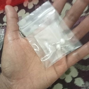 Dharshini added a photo of their purchase