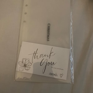 Sarah added a photo of their purchase