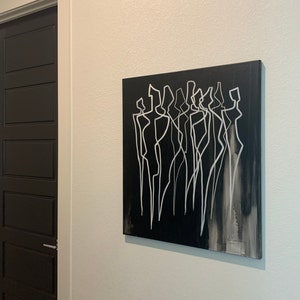 Nikki added a photo of their purchase