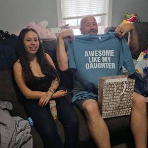 Tina added a photo of their purchase