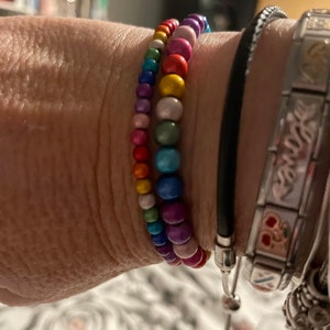 Set di braccialetti con perline di vetro stile arcobaleno da 7 pezzo per donna all'ingrosso