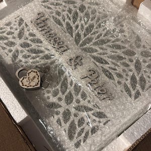 Nadine added a photo of their purchase