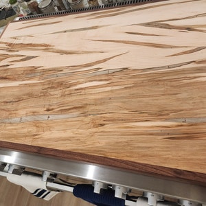 Hina added a photo of their purchase