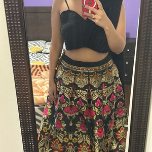 Nisha added a photo of their purchase