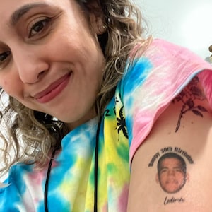 CAROLINE added a photo of their purchase
