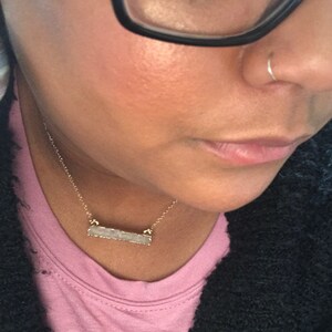 Denisha added a photo of their purchase