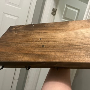 Ashley added a photo of their purchase