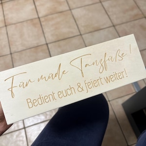 Laura added a photo of their purchase
