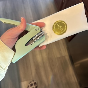 Kayleigh added a photo of their purchase