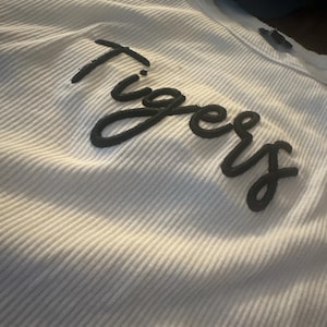 Ellen added a photo of their purchase