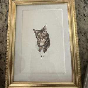Caitlin added a photo of their purchase