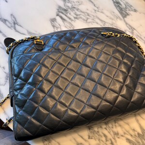 Vintage CHANEL Black Lamb Leather Large Bag With Double Golden
