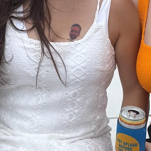 Shaina added a photo of their purchase