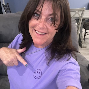Sharon added a photo of their purchase
