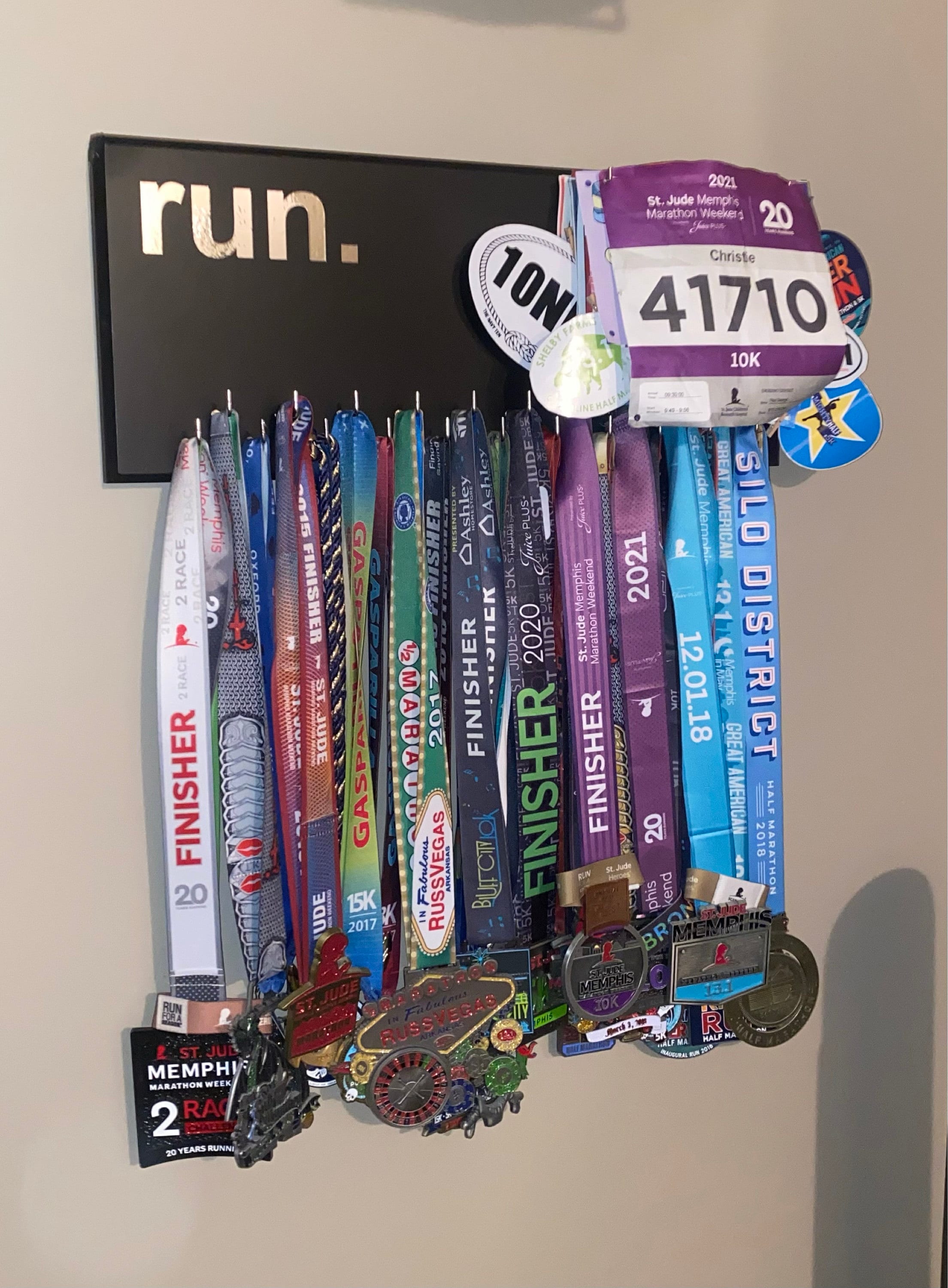 Running Medal Holder, gray or black with chrome "run." vinyl, 21 hooks and BIB holder