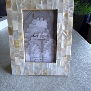 Kimberly added a photo of their purchase