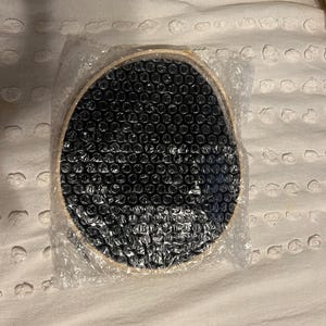 Natalie added a photo of their purchase