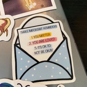 Sarah added a photo of their purchase