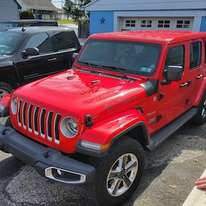 Roxanne added a photo of their purchase