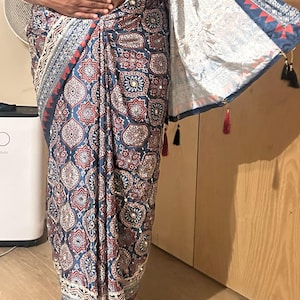 Roshni added a photo of their purchase