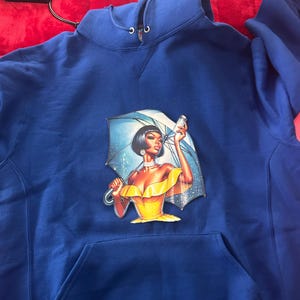 Latasha added a photo of their purchase