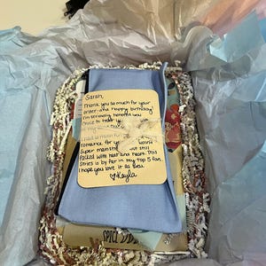 Sarah added a photo of their purchase