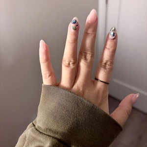 Janet added a photo of their purchase