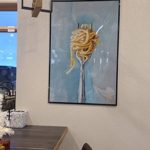 Gina added a photo of their purchase