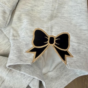 Cassie added a photo of their purchase