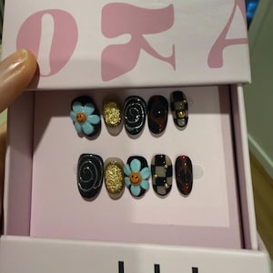 Sara added a photo of their purchase
